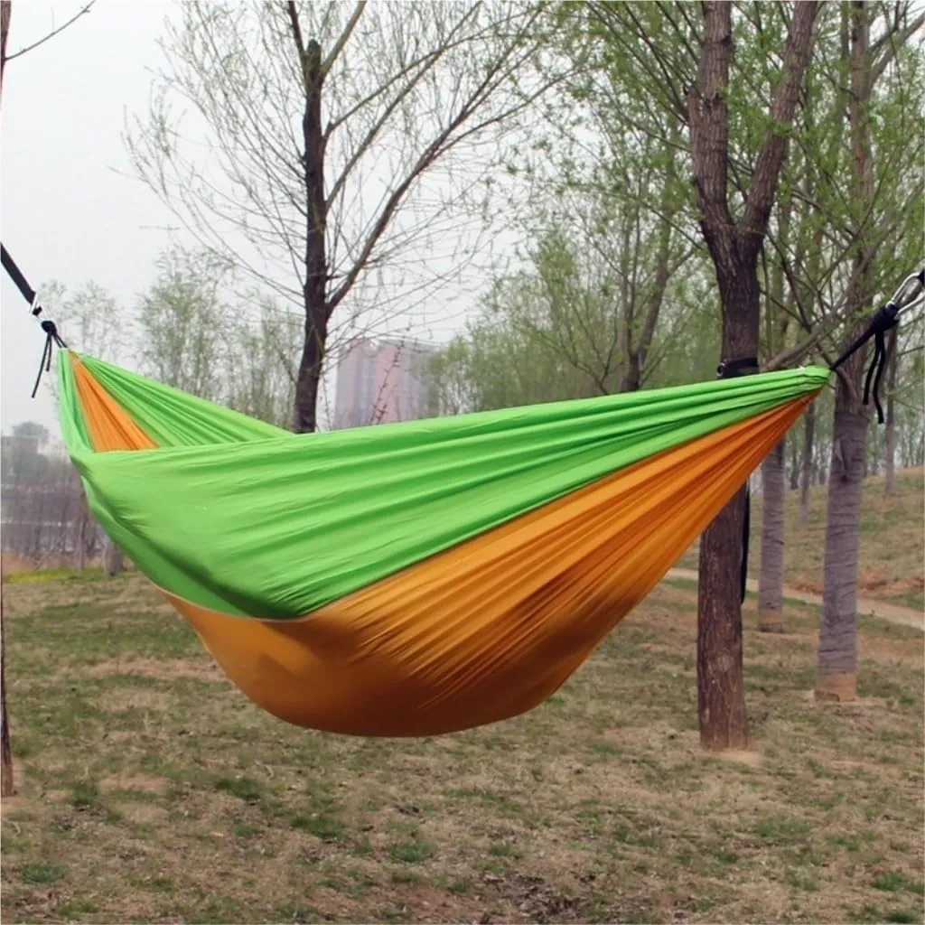Hammock Outdoor Single Double Parachute Cloth Hammock Outdoor Light Breathable Swing Chair Portable Camping Hammock Hammocks for Outside(Orange)